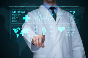 Doctor working on a virtual screen. medical technology concept. pulse Doctor working on a virtual screen. medical technology concept (iStock)
